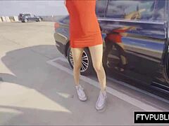 An amateur blonde is flashing and masturbating in public outdoors.