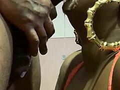 Ebony bbw gives sloppy blowjob to milf