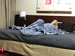 Couple In Hotel Room.