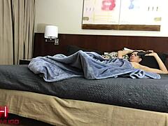 Couple In Hotel Room.