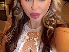 What outfit would you choose to fuck this milf with big natural tits in? 😏