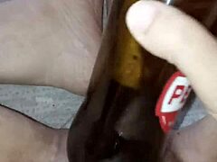 gretala, being pregnant and excited, rubs the bottle on her juicy pussy lips