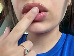 Latina Spits on Tongue in Fetish Play.