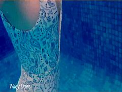 Milf Flashes Tits In Hotel Pool?