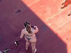 Neighbors sunbathing in bikinis on the terrace