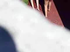 Neighbors sunbathing in bikinis on the terrace