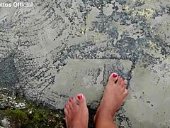 Dirty Wet Barefoot Feet on the Street