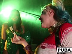 poison ivy sticks a bat up harley's ass in this lesbian sex scene