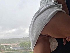 After the shower, she achieves a hot orgasm near the window