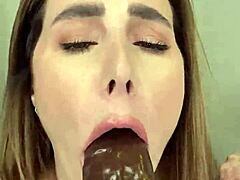 paige in fishnets takes a big black dildo and ends with her mouth