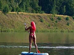 Sup and pink micro bikini in outdoor nature public flashing setting