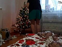 While she's DECORATING the Christmas tree I was STROKING my cock RISKY close!! 😈