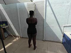 Ebony exposes big pierced boobs